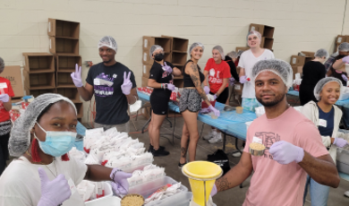 BSU volunteers pack up boxes of food for those in need 
